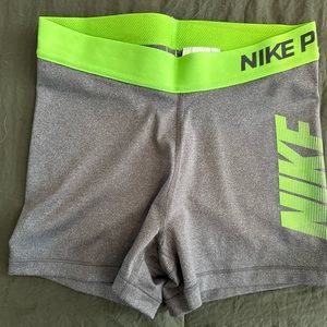 Nike pro spandex shorts, size small. Gray and lime green.